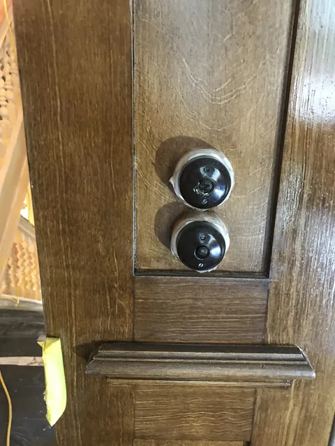 Faux wood graining, door with fittings — west end house